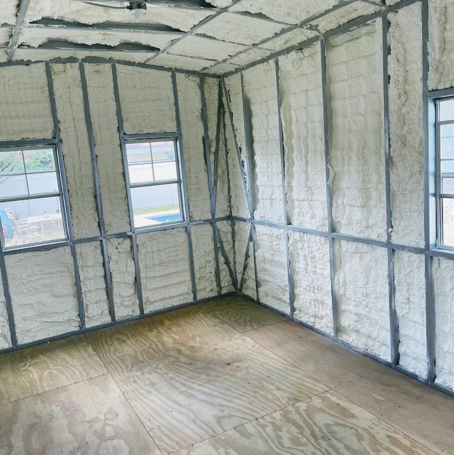 Closed-cell spray foam insulation applied to wall cavities in a residential project in Pendleton
